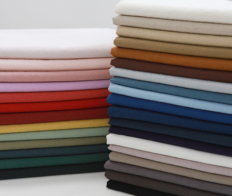 Sólido casual de la firmeza de la ropa 40sX40s 185GSM de Tencel de algodón de la tela de imitación de la camisa el alto teñió