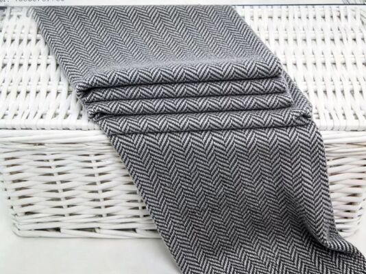 225 GSM Herringbone 50% de lana, abrigo, traje de tela, elegancia atemporal con un estilo europeo noble