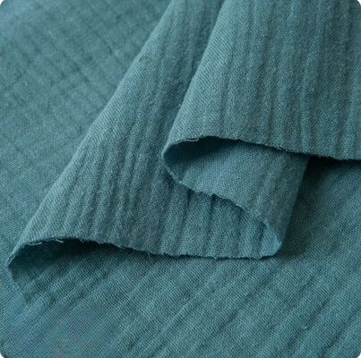135GSM Tejido de doble gasa de algodón 100% con más de 200 colores de stock listos para ropa para bebés y niños