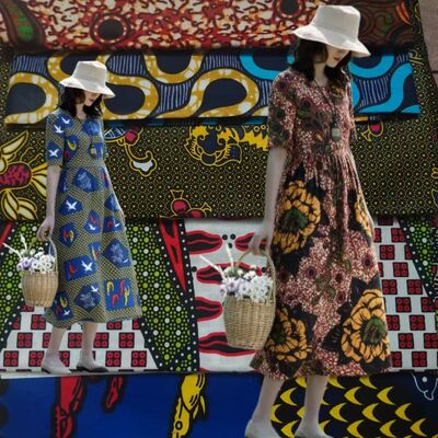 Tela de cera africana 100% algodón con alta resistencia a las arrugas y colores vibrantes para vestidos Ankara y Kitenge